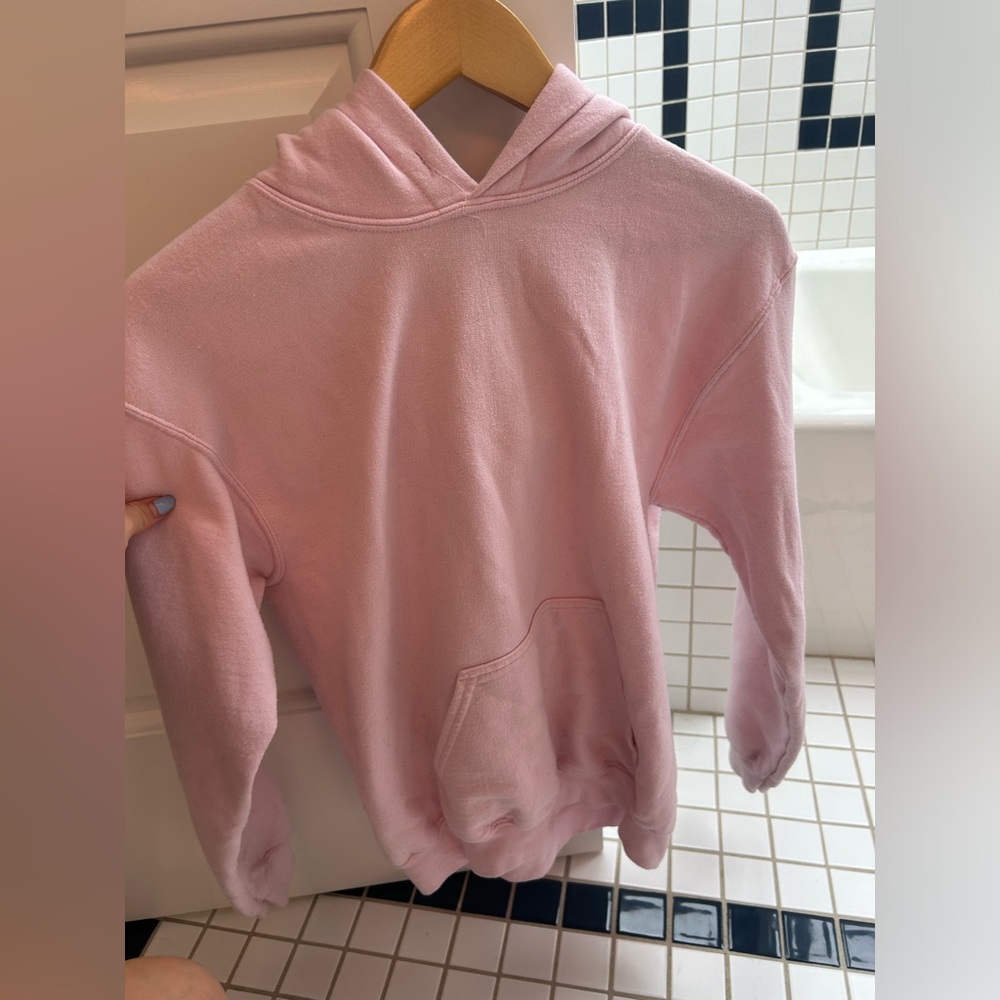 pink sweatshirt with saying on the back size s